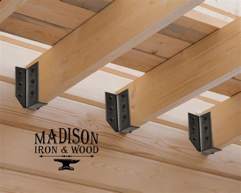 supports undee hoise use metal brackets|joist brackets and connectors.